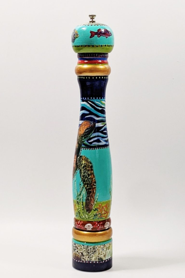 Hand-painted pepper mill depicting a turtle swimming in a turquoise ocean